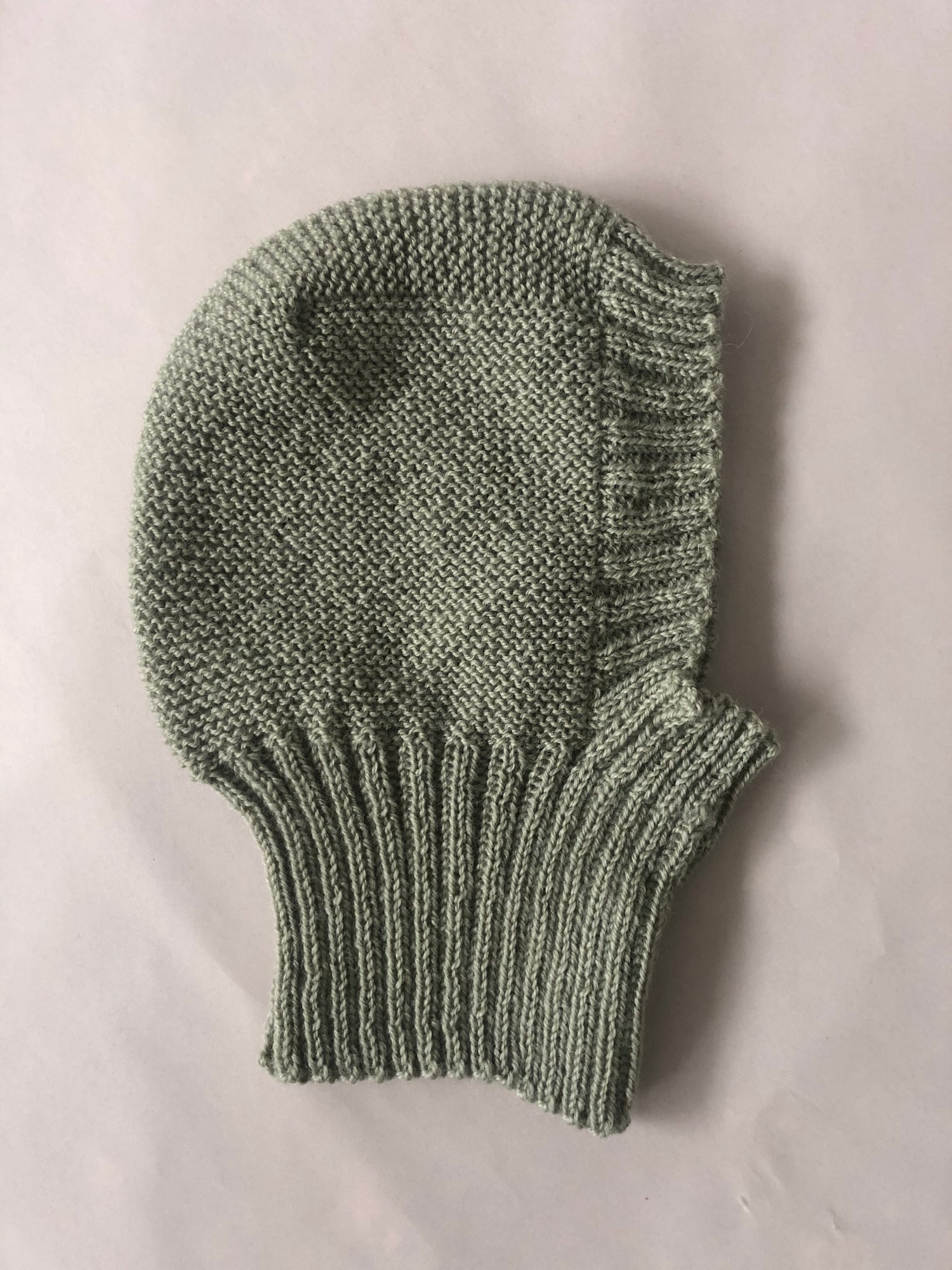 Flat lay Handknitted balaclava aileen chen