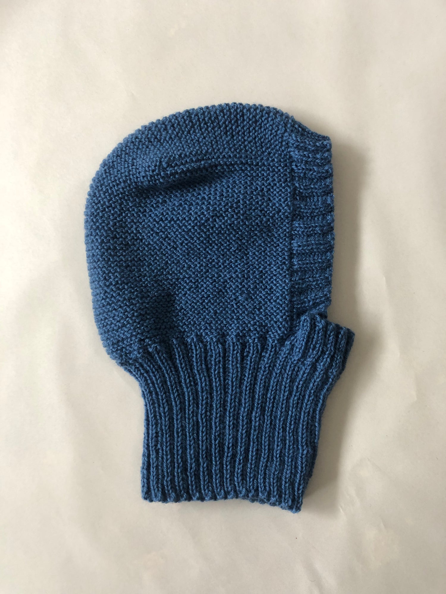 Flat lay Handknitted balaclava aileen chen