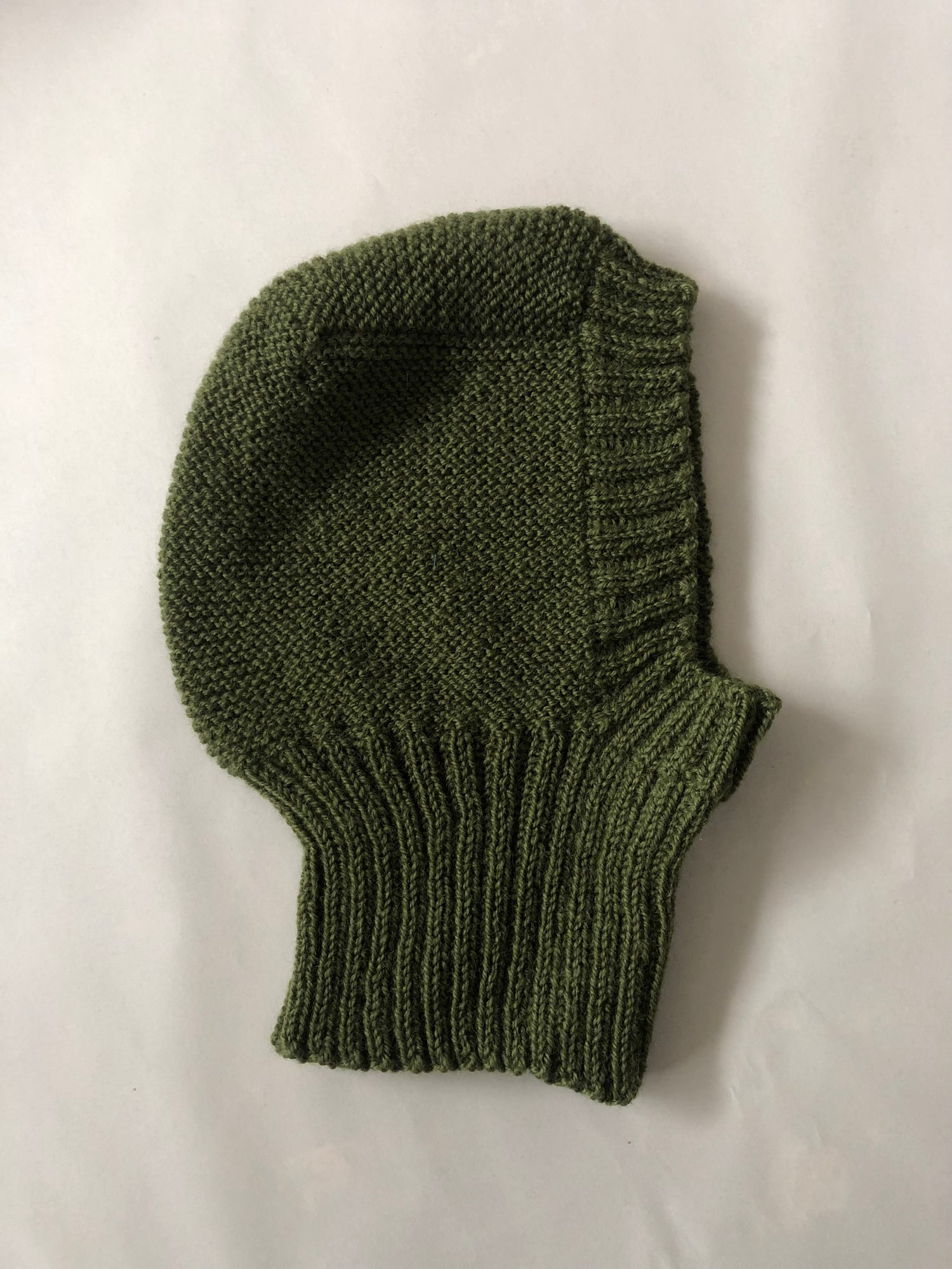 Flat lay Handknitted balaclava aileen chen