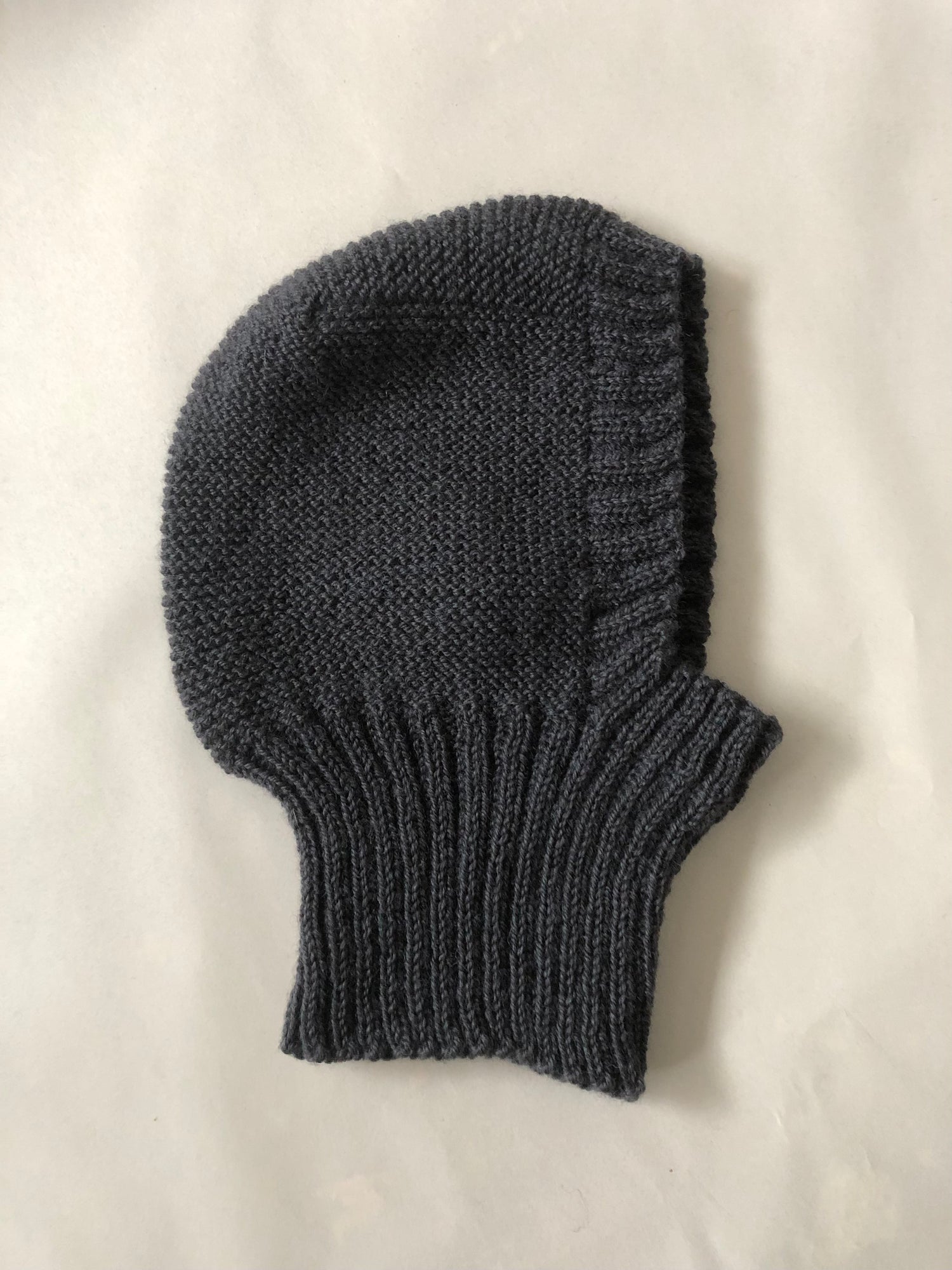 Flat lay Handknitted balaclava aileen chen